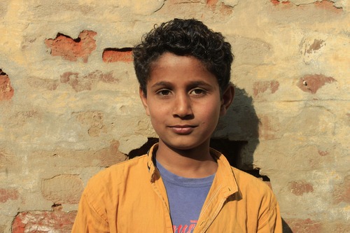 Boy raised by authoritarian parents.