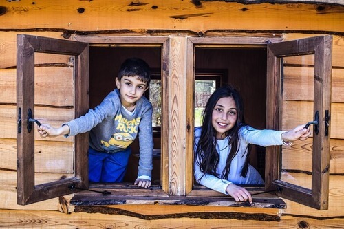 Children in playhouse