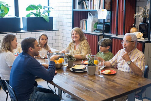 Family enjoying dinner together.