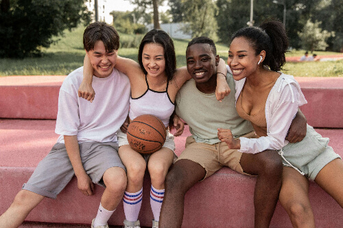 Four confident teen friends.