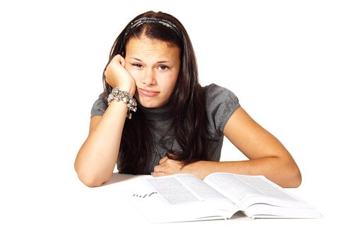 Girl not wanting to do homework.