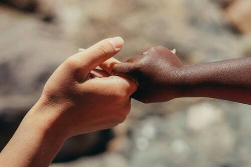 What are Parental Rights - Parent and child holding hands adoption