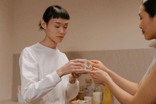 Mom and daughter having tea Mom and daughter having tea