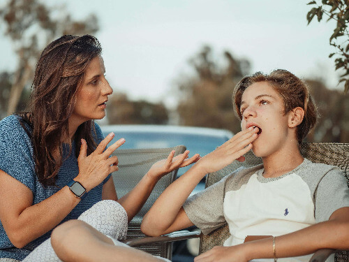 Mom scolding son