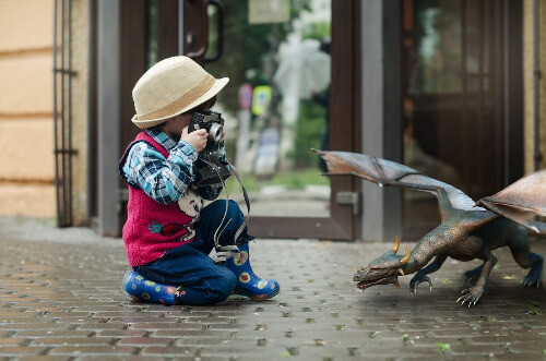 Toddler taking photo