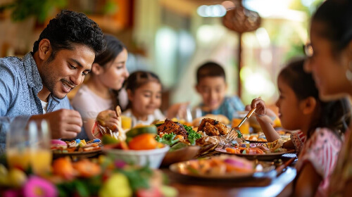 Blended family having dinner together.