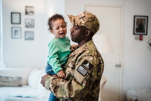 Dad saying goodbye, son upset.