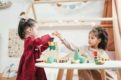 Girls playing crafts