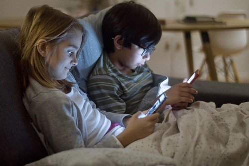Kids on phones.