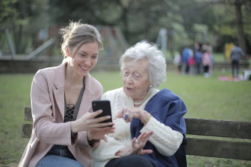 Lady and mom on bench. Lady and mom on bench.