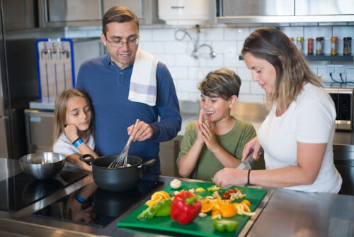 Mom and dad cooking with kids