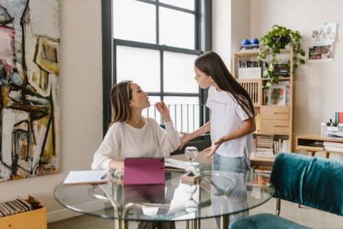 Mom and daughter arguing. 
