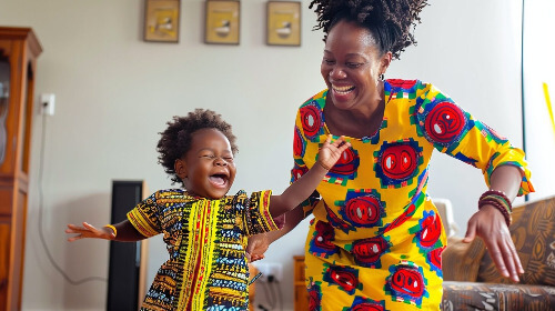 Mom and toddler dancing.