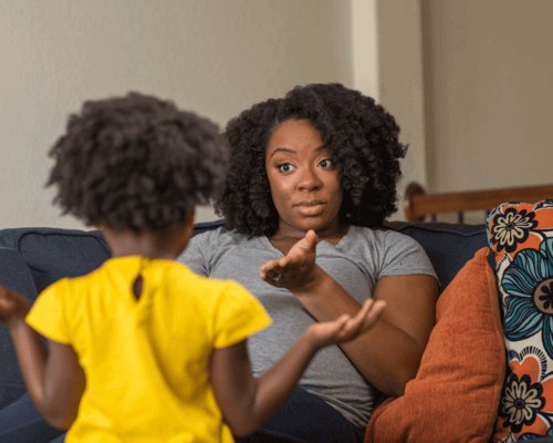Mom having a serious discussion with child