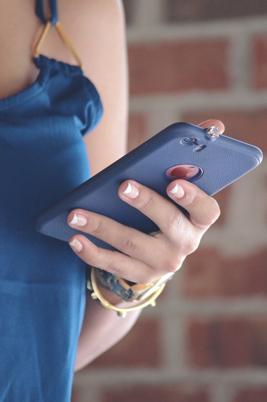 Female teen social media on phone. 