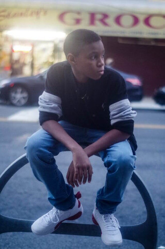 Teenage boy on bench